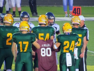 At every home game, our Spartan team carries the jersey of Alex Miller, #80 from Roane County. Miller collapsed during his game on 9/13 and passed away.