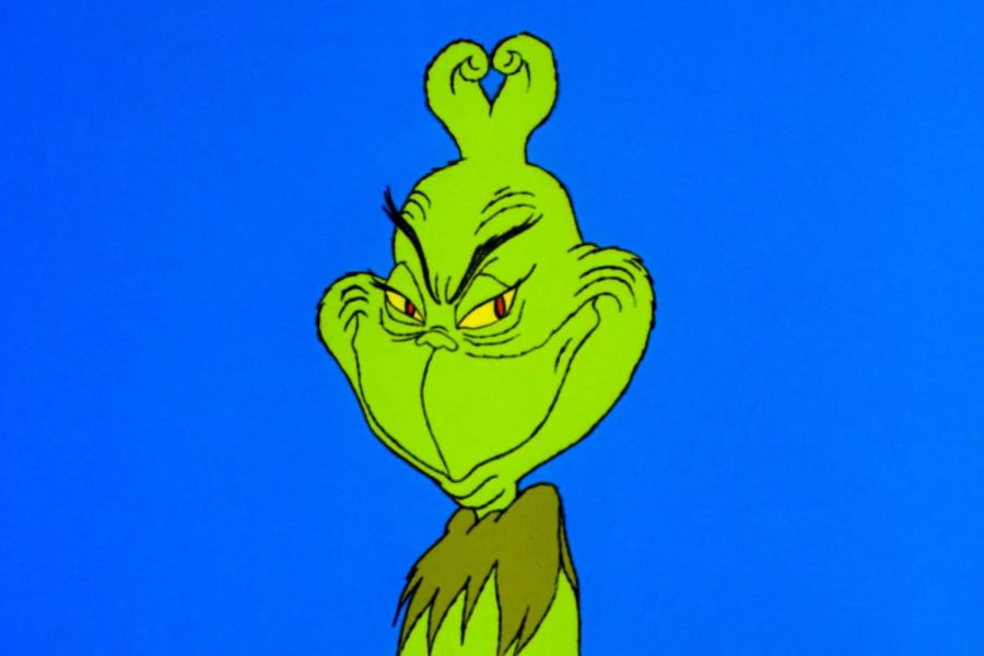 Picture of the Grinch smiling.