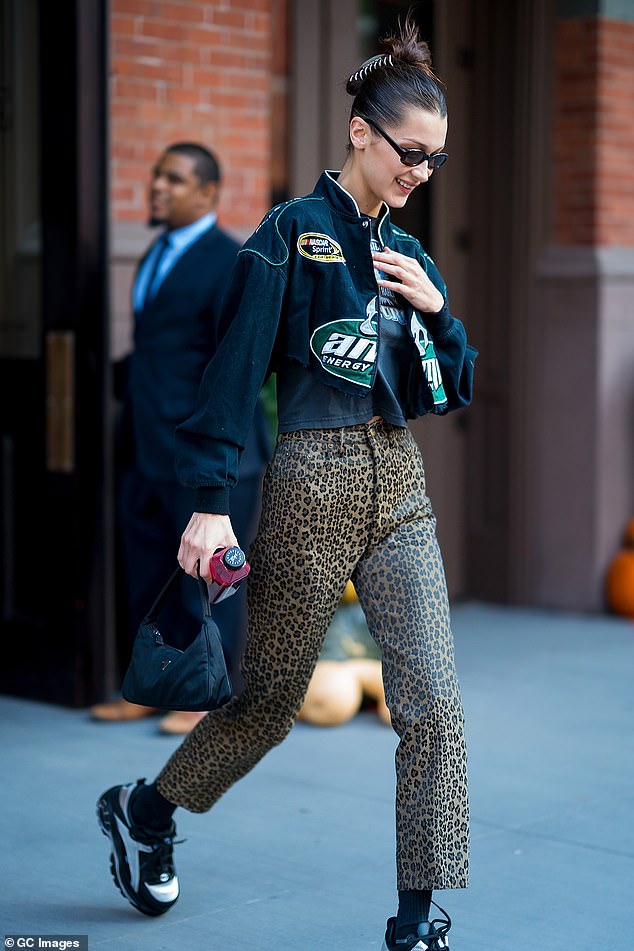 Bella Hadid wearing leopard print pants