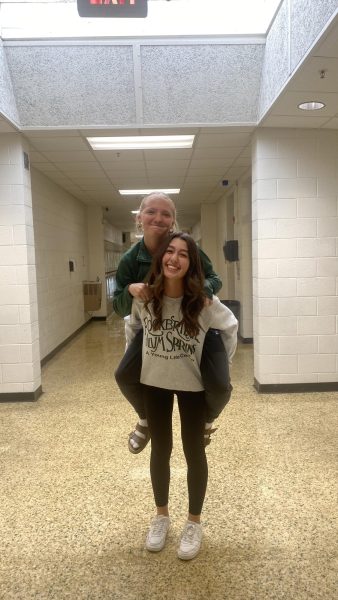 Raelyn Snedegar (riding piggyback) - Philippians 4:13 "For I can do everything through Christ, who gives me strength"  Photo Credit: Amelia Malus